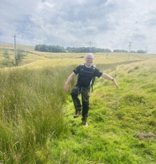 Peter showing us his wet leg after attempting to cross a small stream